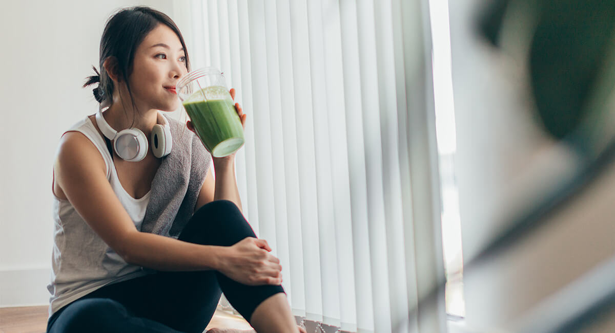 Woman drinking a smoothie