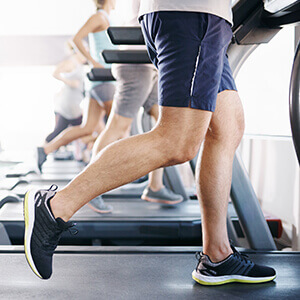 Man running on a treadmill