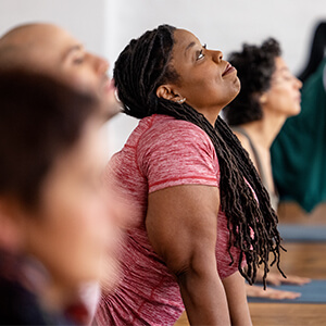 Group of people doing yoga
